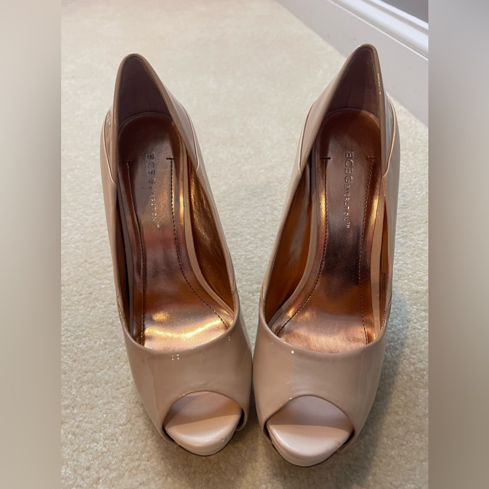 BCBGeneration Taupe color platform peep toe high heels.